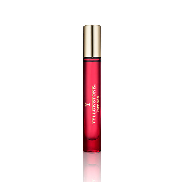 Red Yellowstone perfume bottle with gold cap on a white background