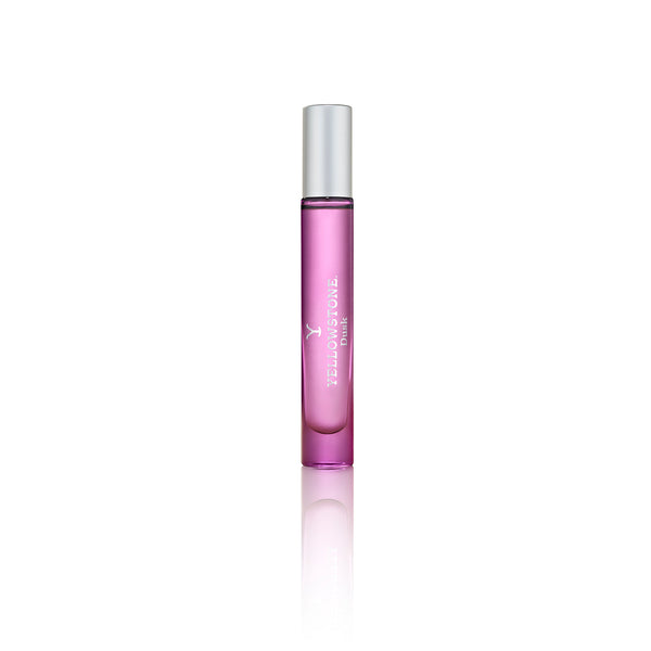 Pink rollerball perfume bottle with silver cap on a white background